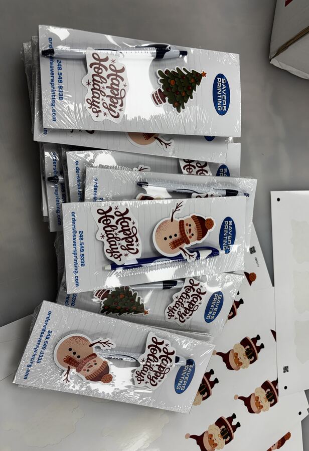 Custom-shaped holiday promotional notepads &mdash; Savers Printing